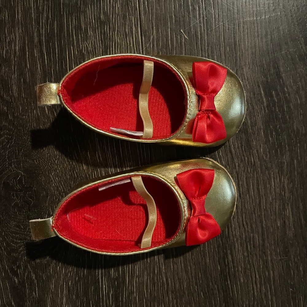 Gold Shoes with Red Bows